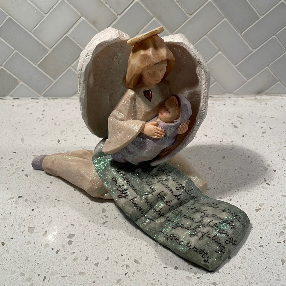 Foundations by Karen Hahn angel holding baby figurine